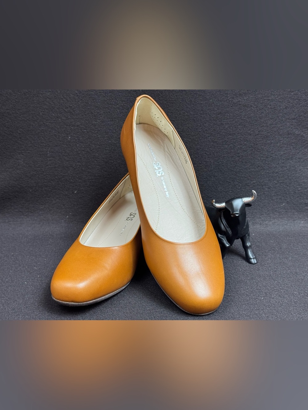 SAS women's Sofia wedge pump shoes in a brown leather finish.